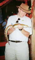 A picture of me holding a crocodile.